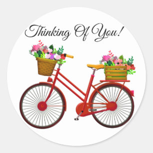 Rode fiets met mand bloemen ronde sticker