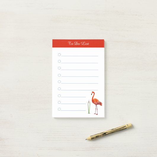 Rode flamingo en kalligrafie op witte bekleding post-it® notes (Op bureau)