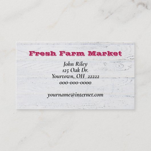 Rode frambozen in de hand visitekaartje (Achterkant)