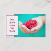 Rode frambozen in de hand visitekaartje (Voorkant)