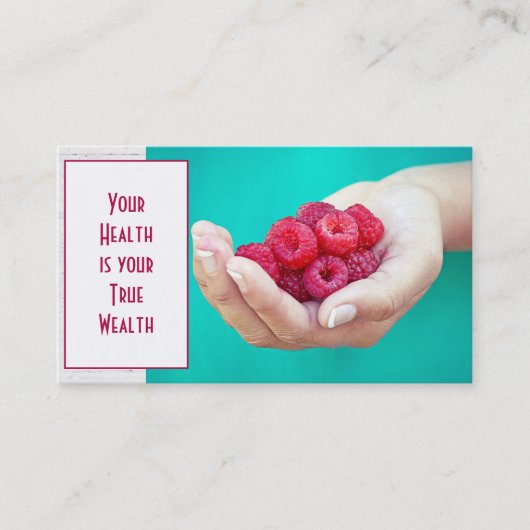 Rode frambozen in de hand visitekaartje (Voorkant)