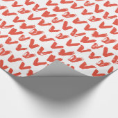 Rode gekleurde harten patroon op wit cadeaupapier (Hoek)