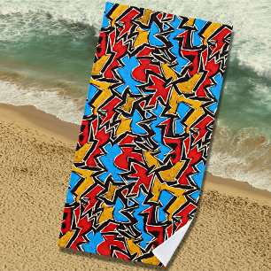 Rode gele zwarte graffiti op blauw strandlaken
