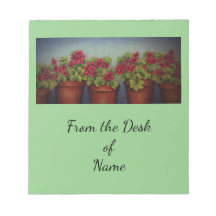 Rode Geraniums in kleipotten