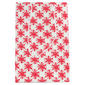 Rode gestippelde sterren op wit medium cadeauzakje (Voorkant)