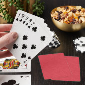 Rode gestructureerde oppervlakte met subtiel draai pokerkaarten (Insitu)