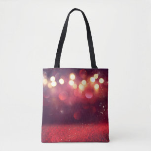 Rode glitter  licht achtergrond. defocusedba tote bag