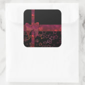 Rode glitterboog en zwarte sterren vierkante sticker (Tas)