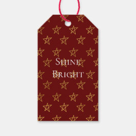 Rode gouden sterren schitteren helder cadeaulabel