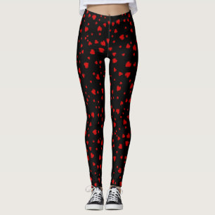 Rode harten drijvend patroon op zwart leggings