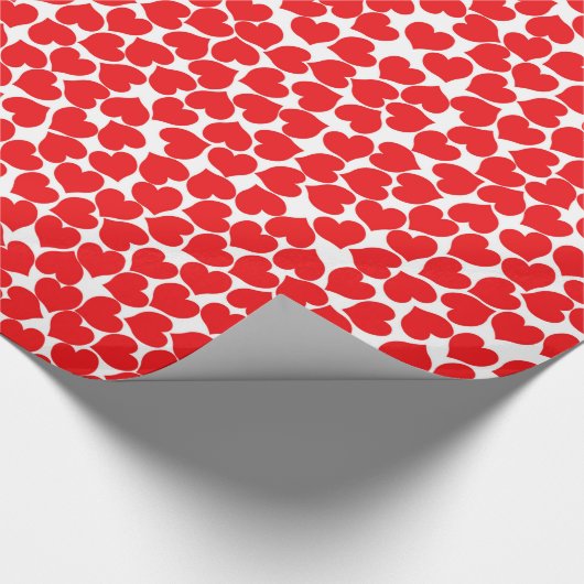 Rode harten op wit cadeaupapier (Hoek)