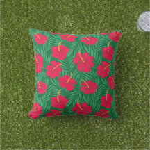 Rode Hibiscus bloemen op groene tropische bladeren