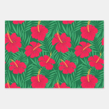 Rode Hibiscus bloemen op groene tropische bladeren