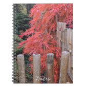 Rode Japanse esdoornbladeren en bamboe hek Notitieboek (Voorkant)