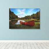 Rode kano op de oever van het meer canvas afdruk (Insitu (Houten vloer))