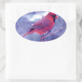 Rode kardinaal in de Blizzard Ovale Sticker (Tas)