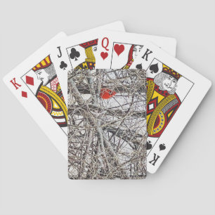 Rode kardinaal in een boom op een sneeuwvolle dag pokerkaarten