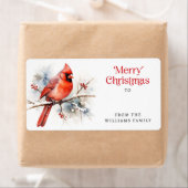 Rode kardinaal op wintertak Vrolijk kerstcadeau Etiket (Insitu)