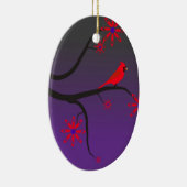 Rode kardinale vogel in een boom op paarse achterg keramisch ornament (Rechts)