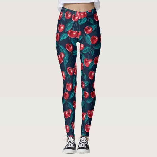 Rode kersen op donkerblauw leggings (Voorkant)