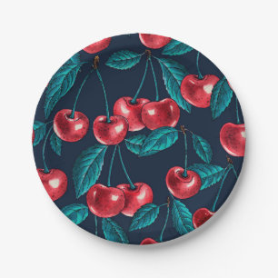 Rode kersen op donkerblauw papieren bordje