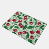 Rode kersen op lichtgroene gingham deurmat (Schuin)