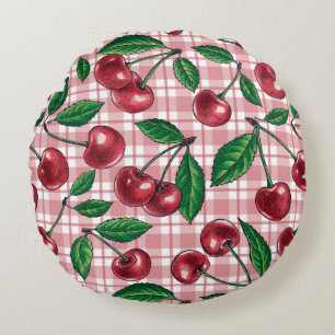 Rode kersen op roze gingham rond kussen