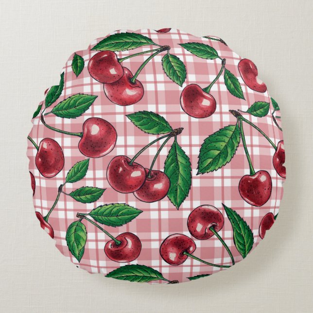 Rode kersen op roze gingham rond kussen (Voorkant)