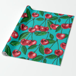 Rode kersen op turkooizen cadeaupapier