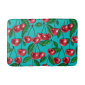 Rode kersen op turquoise badmat (Voorkant)