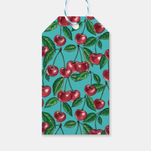Rode kersen op turquoise cadeaulabel (Voorkant)