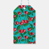 Rode kersen op turquoise cadeaulabel (Achterkant)