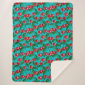 Rode kersen op turquoise sherpa deken (Voorkant)
