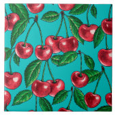 Rode kersen op turquoise tegeltje (Voorkant)
