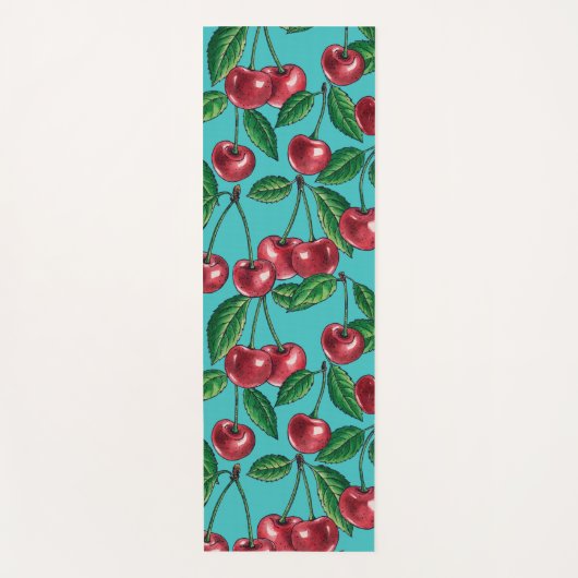 Rode kersen op turquoise yogamat (Voorkant)