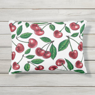 Rode kersen op wit buitenkussen