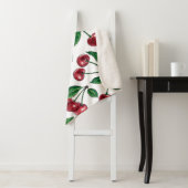 Rode kersen op wit sherpa deken (In situ)