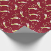 Rode kerst inpakpapier sterren & nepgloeiing (Hoek)