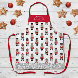 Rode kerst notenkrakerpatroon schort<br><div class="desc">Een eenvoudig patroon van een rode,  zwarte en zilveren kerstnotenkraker siert dit schort. Maakt een leuk kerstcadeau. Personaliseer het met jouw naam dit kerstseizoen. Ontworpen voor u door Blackberry Boulevard.</div>