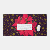 Rode kerstbloem, dunne gouden sterren op bureaumat (Keyboard & Muis)