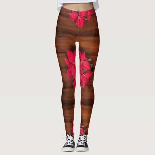 Rode kerstbloem op bruin leggings (Voorkant)