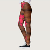 Rode kerstbloem op bruin leggings (Links)
