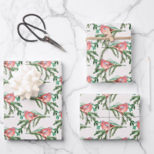 Rode kerstkardinaal op pine tak inpakpapier vel