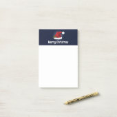 Rode Kerstmanhoed met Kersthulst en aangepaste tek Post-it® Notes (Op bureau)