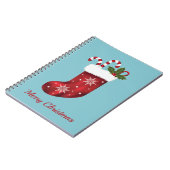 Rode Kerstsok Op Blauwe Achtergrond Met Aangepaste Notitieboek (Linkerzijde)