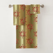 Rode kerststerren op goud bad handdoek (Insitu)