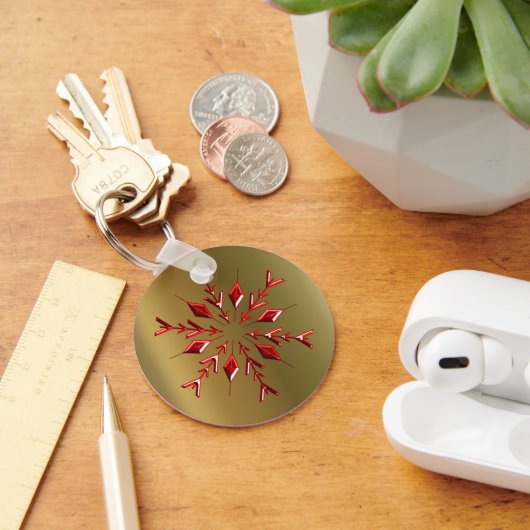 Rode kerststerren op goud sleutelhanger (Bureau)
