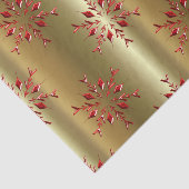 Rode kerststerren op goud tissuepapier (Detail)