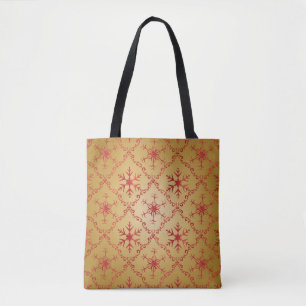 Rode kerststerren op goud tote bag