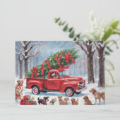 Rode kersttruck in het besneeuwde bos met honden feestdagenkaart (Staand voorkant)